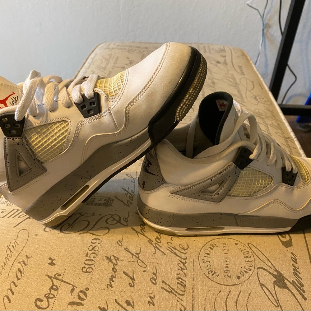 Jordan 4 cement size 7y womens 8.5